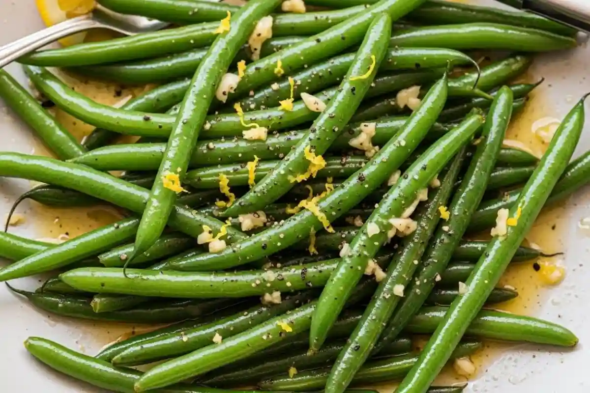 Sautéed green beans in garlic butter.