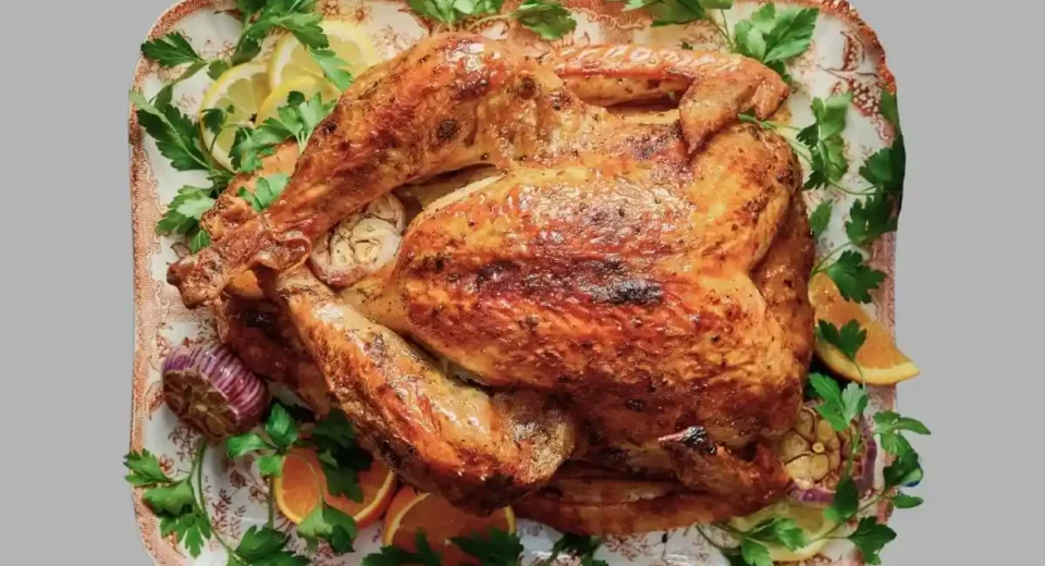 Juicy turkey roasted with fresh herbs like rosemary, thyme, and sage.