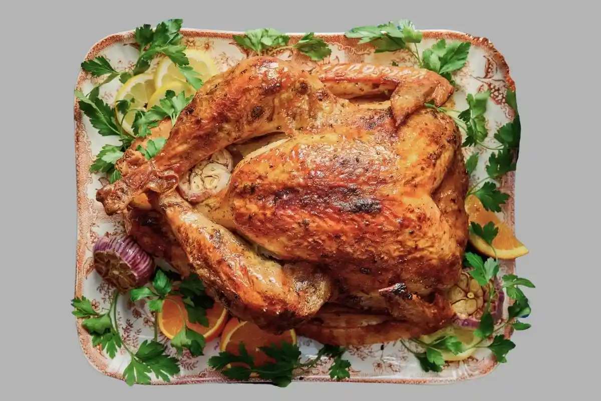 Juicy turkey roasted with fresh herbs like rosemary, thyme, and sage.