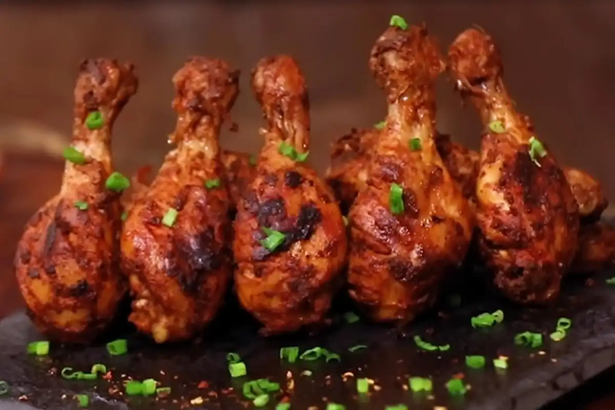 Smoky Red Chicken delivers juicy fried chicken coated in a bold red spice mix and finished with a quick charcoal smoke for a restaurant-style aroma